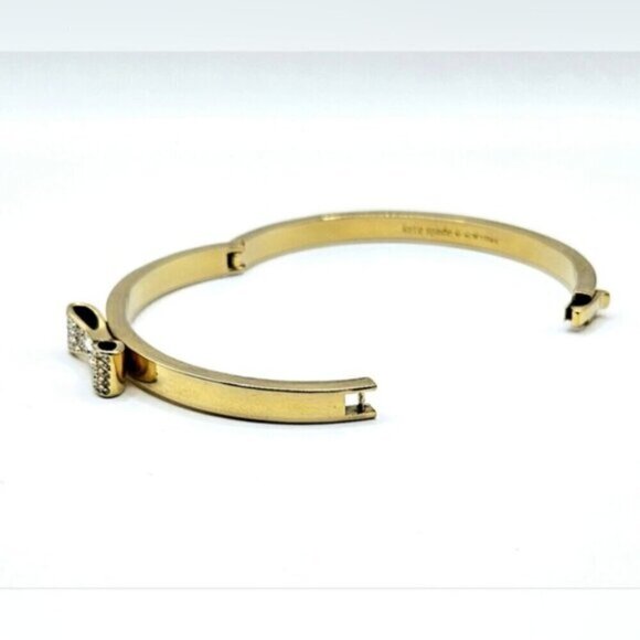 Kate Spade New York Gold-Tone Bow Bangle Bracelet with Crystals + Pouch - Picture 10 of 10